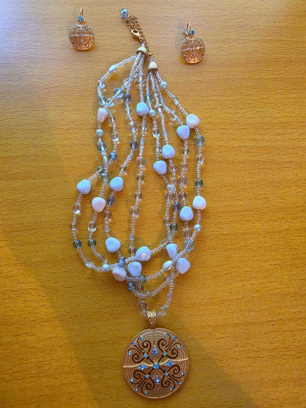 Avon By Nina Ricci Gold-Tone Pendant Necklace with White, Blue and Clear Accents